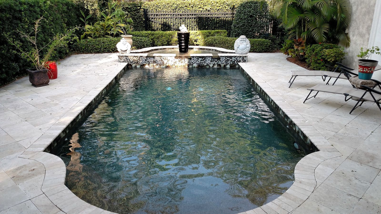 Rectangular lap pool with a mosaic tile waterline