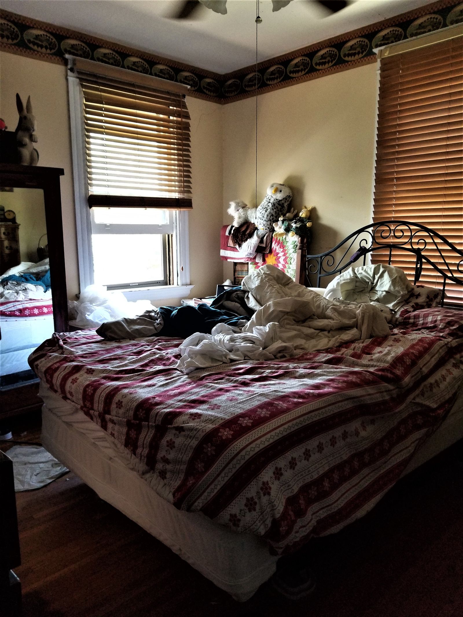 Dated master bedroom before renovation
